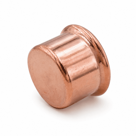Copper end cap on a white background